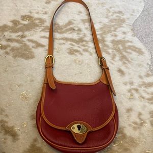 Dooney & Bourke crossbody All weather Leather made in USA.